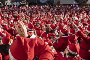 GENOA, ITALY - DECEMBER 22 2019 - Traditional Santa claus walk photo