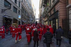 GENOA, ITALY - DECEMBER 22 2019 - Traditional Santa claus walk photo