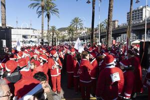 GENOA, ITALY - DECEMBER 22 2019 - Traditional Santa claus walk photo