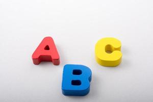 Letters of abc of alphabet on white color photo
