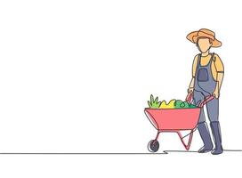 Single one line drawing of young male farmer standing beside the wheelbarrow trolley filled with fruits. Farming challenge minimalist concept. Continuous line draw design graphic vector illustration