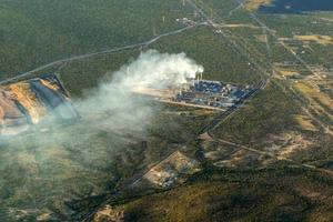 coal powerhouse electric farm smoke while polluting air aerial view photo
