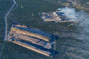 coal powerhouse electric farm smoke while polluting air aerial view photo