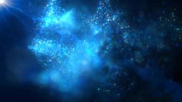 Abstract background of blue particles of energy magic waves flying from the wind with the effect of glow and blur bokeh. Video 4k, 60 fps