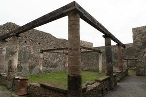 NAPLES, ITALY - FEBRUARY 1 2020 - pompei ruins paintings and mosaic photo