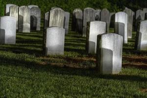 spooky Old usa cemetery grave yard at night photo