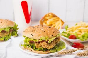 fresh tasty burger isolated on white background photo