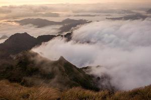 The beautiful sea mist cover the highland mountains named Phu Chi Dao located in Chiang Rai province in the northern region of Thailand. photo