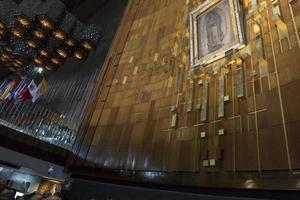 MEXICO CITY, MEXICO - NOVEMBER 4 2017 - Pilgrims at Guadalupe Cathedral photo