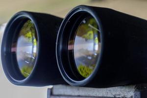 Binoculars detail with glass reflection photo