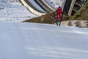 ski jumper while jumping photo