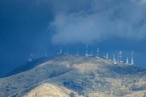 telecom cellular Communication television antennas on top of mountain photo