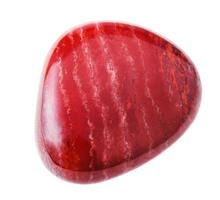 one red Jasper gem stone isolated photo