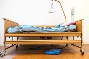 homecare adjustable electric hospital bed at home photo