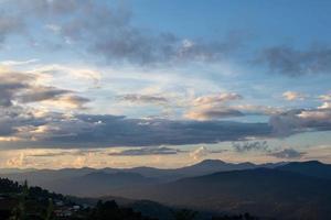 backdrop of the beautiful colors of the sky and the high mountain scenery in Chiang Mai is a beautiful scenery of nature in winter and is popular with tourists. Simple sky background with copy space photo