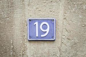 Number nineteen in a wall photo
