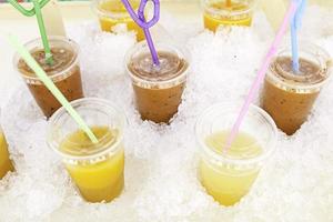 Fruit juices in a market photo