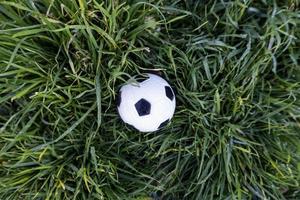 Soccer ball on the grass photo