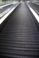 Pedestrian escalators in the city photo