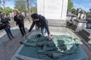 PARIS, FRANCE - MAY 2, 2016  Victor Noir tomb in Paris in the historic Pere Lachaise Cemetery. photo