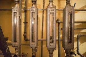 Copper still alembic inside distillery photo