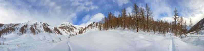 Panoramic view of snowy mountains photo