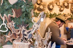 TRENTO, ITALY - DECEMBER 1, 2015 - People at traditional xmas market photo