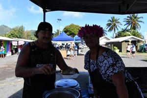 RAROTONGA, COOK ISLANDS - AUGUST 19 2017 - Tourist and locals at popular Saturday Market photo