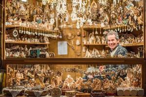 TRENTO, ITALY - DECEMBER 1, 2015 - People at traditional xmas market photo