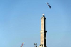 Frecce Tricolori Italy acrobatic flight team over Genoa Lighthouse photo