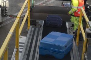 luggage loading on airplane photo