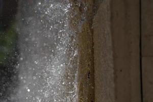 fountain splash on a wall detail photo