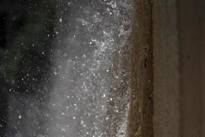fountain splash on a wall detail photo