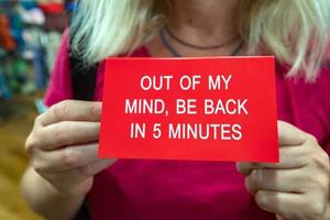 out of my mind be back in 5 minutes sign photo