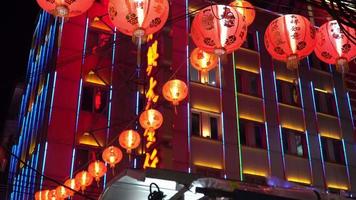 Chinese lanterns during new year festival,money gift for happy lunar new year holiday. chinese sentence means happiness, healthy, lucky and wealthy video