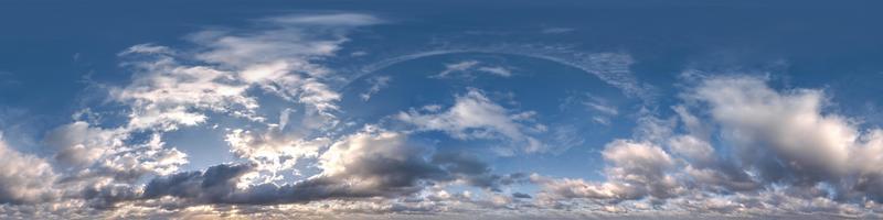 sunset sky with evening clouds as seamless hdri 360 panorama view with zenith in spherical equirectangular format for use in 3d graphics or game development as sky dome or edit drone shot photo