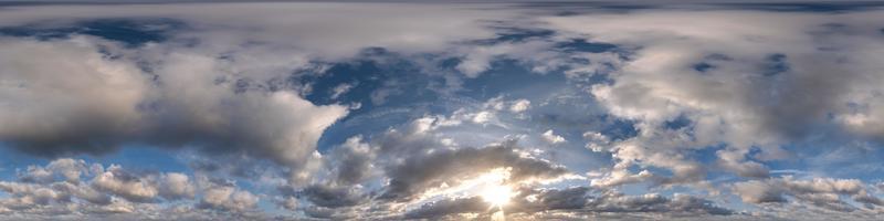 sunset sky with evening clouds as seamless hdri 360 panorama view with zenith in spherical equirectangular format for use in 3d graphics or game development as sky dome or edit drone shot photo