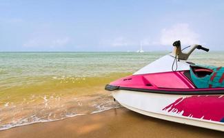 Water scooters on sand photo