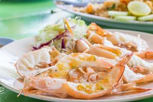 Grilled prawn with sauce photo