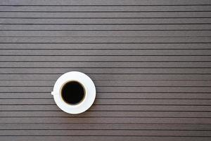 Top view coffee cup on desk table photo