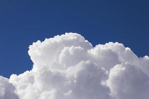 White clouds in blue sky photo