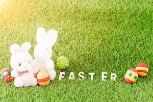 Bunny toys and Easter eggs with text photo