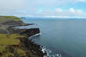 View Of The Ocean From The Volcanic Rocks Coast photo
