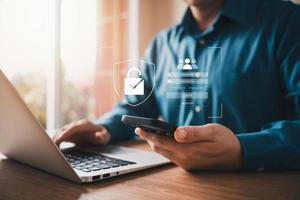 Cybersecurity and privacy concepts to protect data. Lock icon and internet network security technology. Businessmen protecting personal data on virtual interfaces. photo