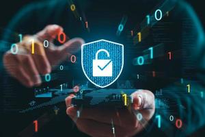 Cybersecurity Privacy data protection concept, businessman holding key protect business and financial data with virtual network connection, security internet access, security encryption. photo