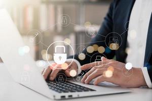Cybersecurity and privacy concepts to protect data. Lock icon and internet network security technology. Businessmen protecting personal data on virtual interfaces. photo