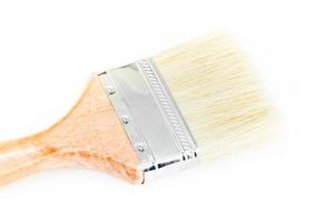 New wood paint brush on white background photo