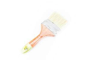 New wood paint brush on white background photo