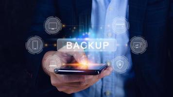 Internet data storage backup on smart phone, technology business concept, Cloud technology, Data storage, Networking and internet service concept. photo