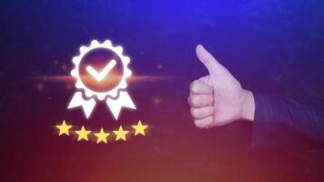 Businessman hand shows the symbol of the top service Quality assurance 5 star with thumb up , Guarantee, best product, Standards, ISO certification and standardization concept. photo